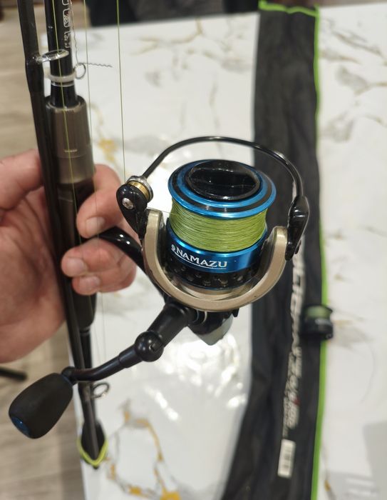 Продам спиннинг с катушкой