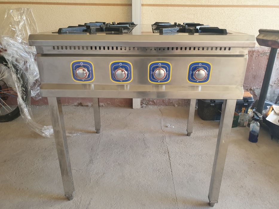 Газ плита 4 х конфорочная