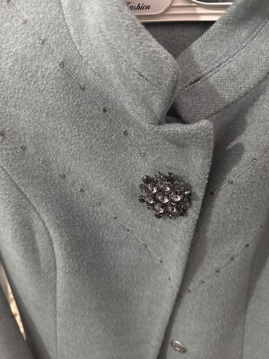 Пальто новый сатылады.