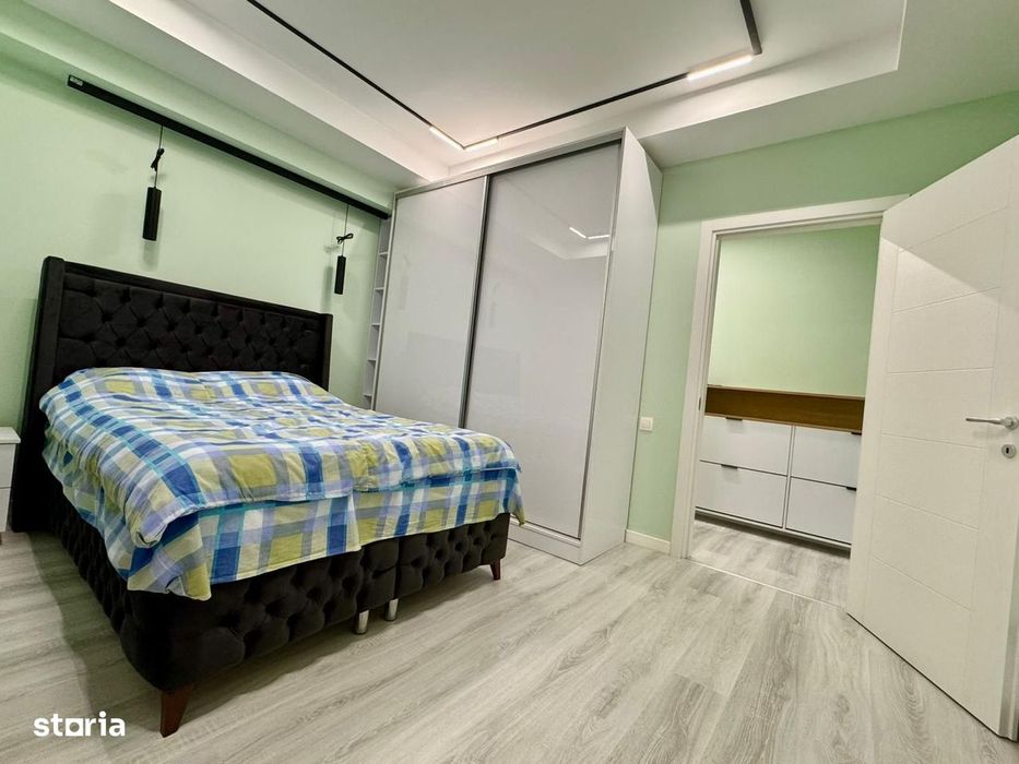 COSMOPOLIS - Apartament cu 3 camere si gradina, mobilat si utilat.
