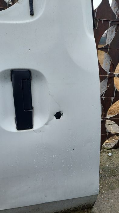 Usa  Dacia Dokker Rulanta dreapta cu defect minor