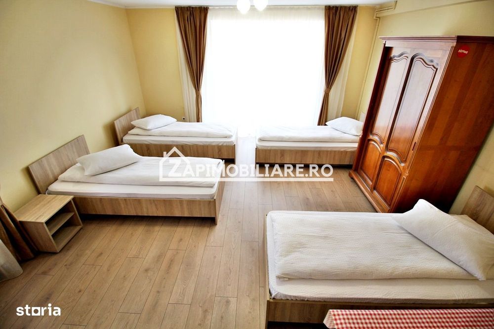 Casa 4 camere,4 bai,1 bucatarie,1 living,120 mp,500mp teren