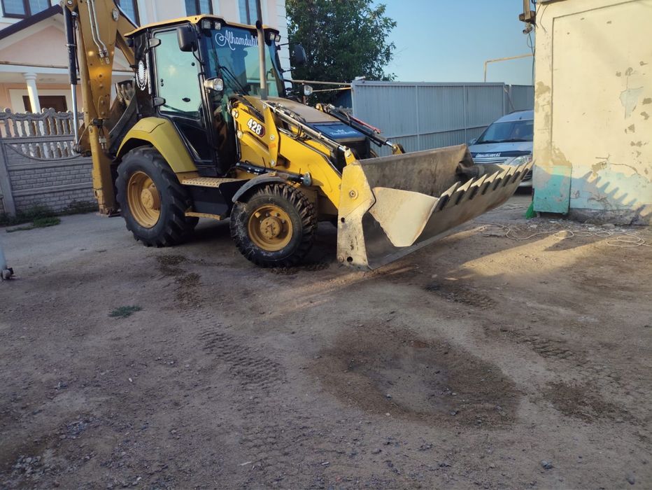 Услуги Экскаватора - Погрузчика CAT 428