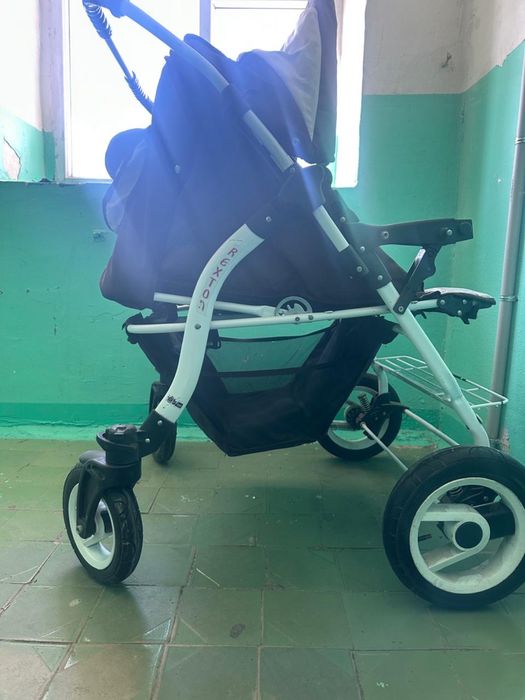 Колеска для близняшек