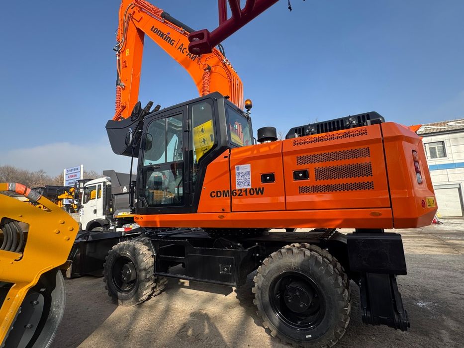 Услуги  аренда экскаватор колёсный 210. Ковш 1.2м3. Полноповоротный.