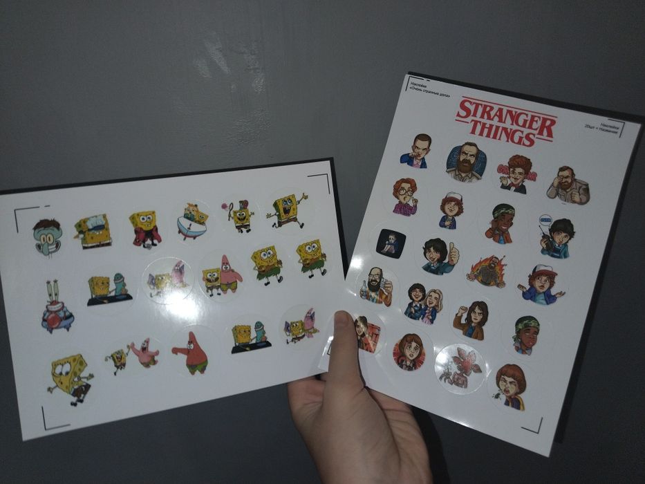 Продам наклейки очень странные дела и Спанч боб есть несколько штук