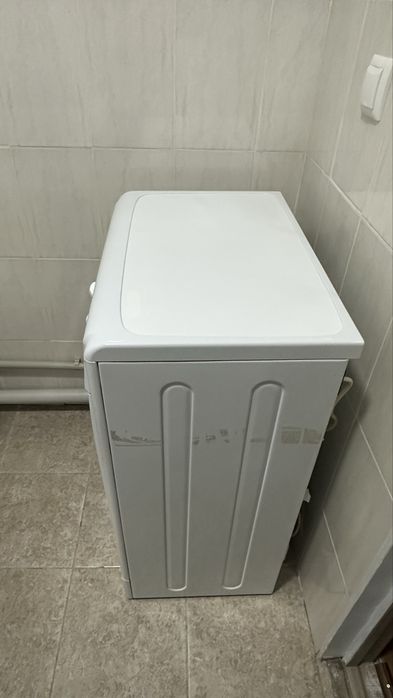 Стиральный машинка и диван