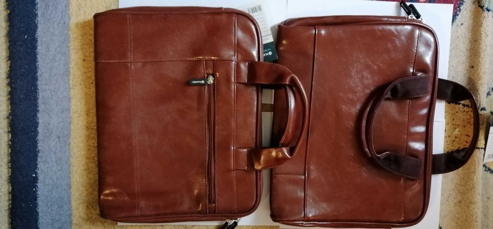 Geanta laptop maronie laptop noua sigilata cu eticheta magazin.