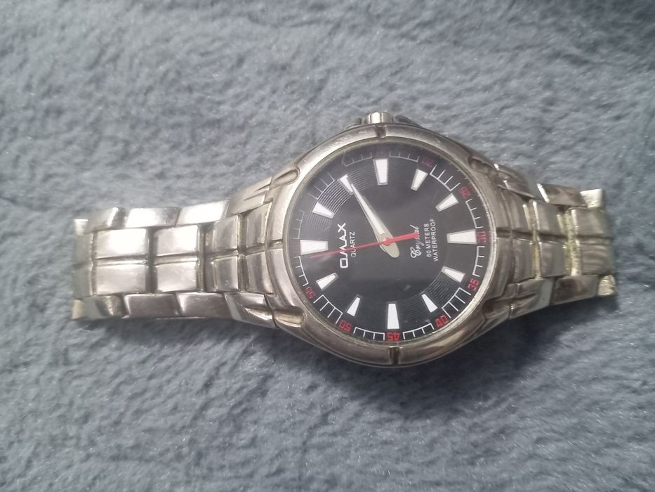 Продам часы Omax
