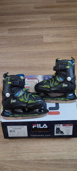 Коньки прогулочные с хоккейным лезвием.