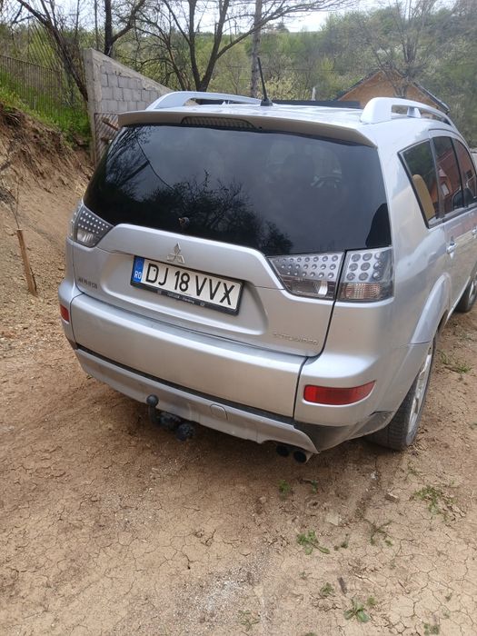 Vind Mitsubishi  Qulender An fab 2008 Amotor 2000 cm Geamuri electrice  ac  4x4.