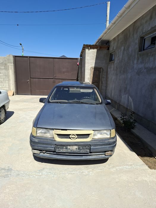 Автомобиль Опель вектра