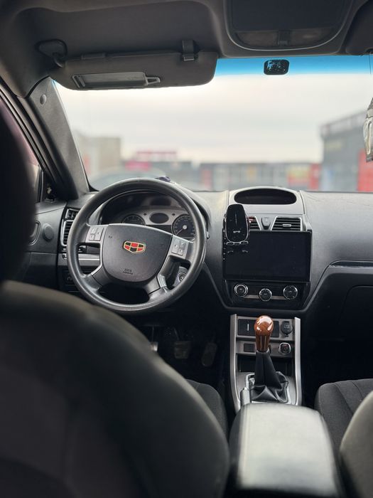 Джили Емгранд ес7