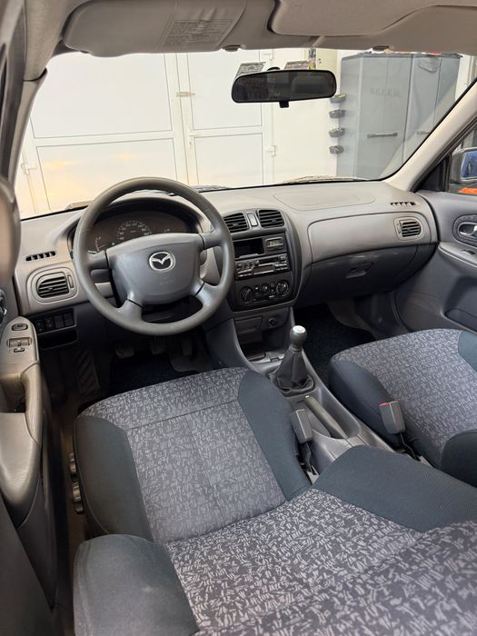 Mazda 323i Sedan 2001 | 1.3i | 90CP | Clima Ac | Radio | 203.000Km