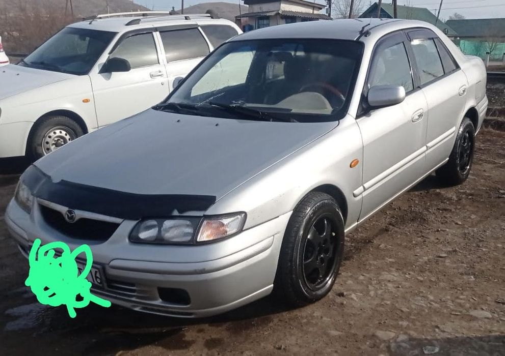 Мазда 626 птичка