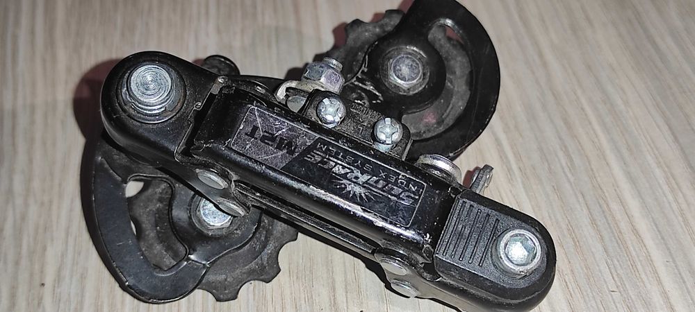 schimbator pt. pinioane bicicleta SUNRACE M2T pt. 6-7 pinioane patina mica pret 40 ron ( lipsa un surub pt. reglaj ( unde intra