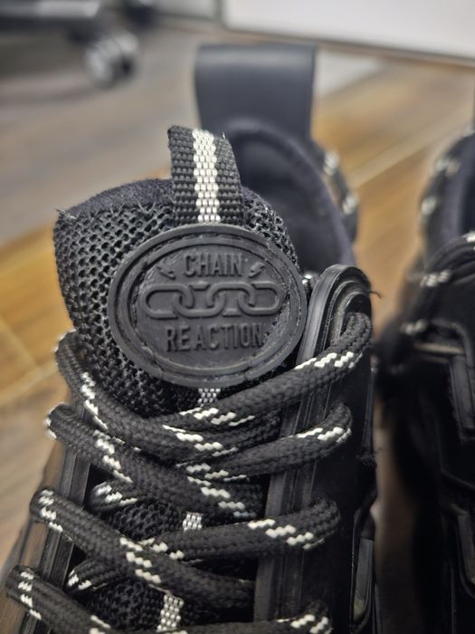 Versace chain reaction