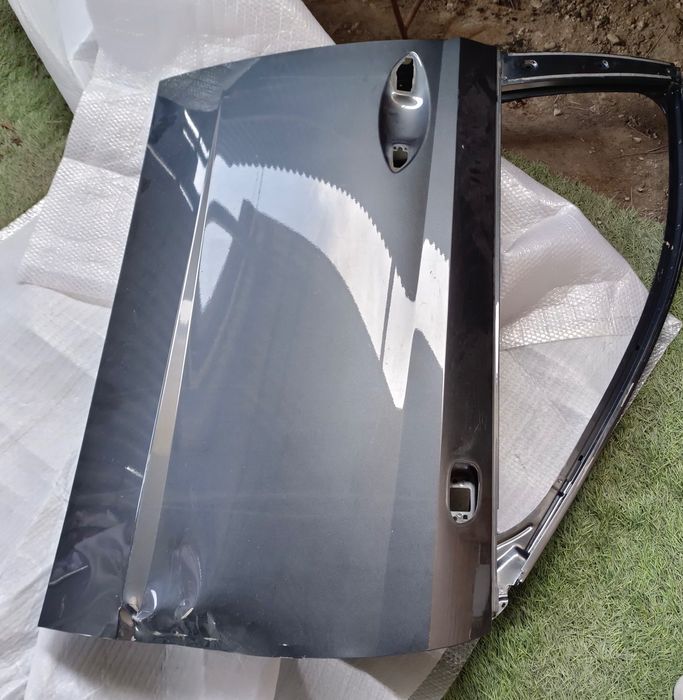 Дверь пассажирское правое крыло