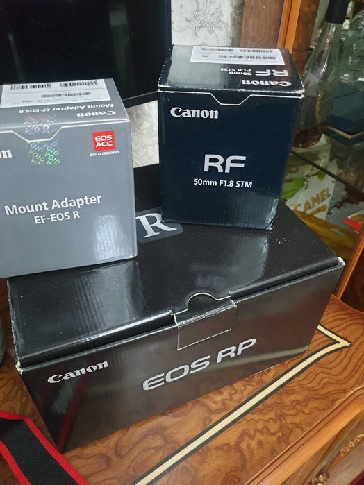 Кенон EF 100macro 2.8 новая в упаковке.запечатан