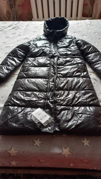 Продам  пуховик женский