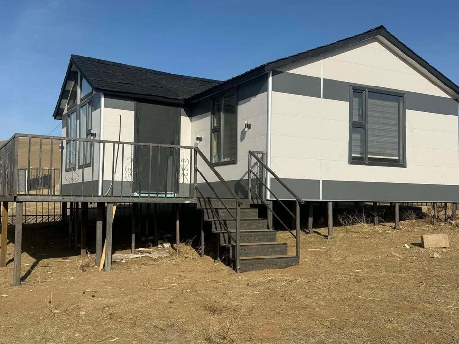 Cand casa din panauri sendwici pe structura metaluca sau din lemn