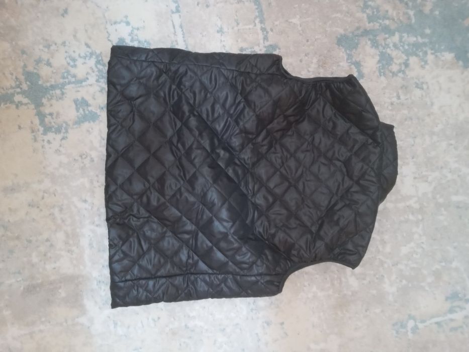 Жилетка тёплая новая