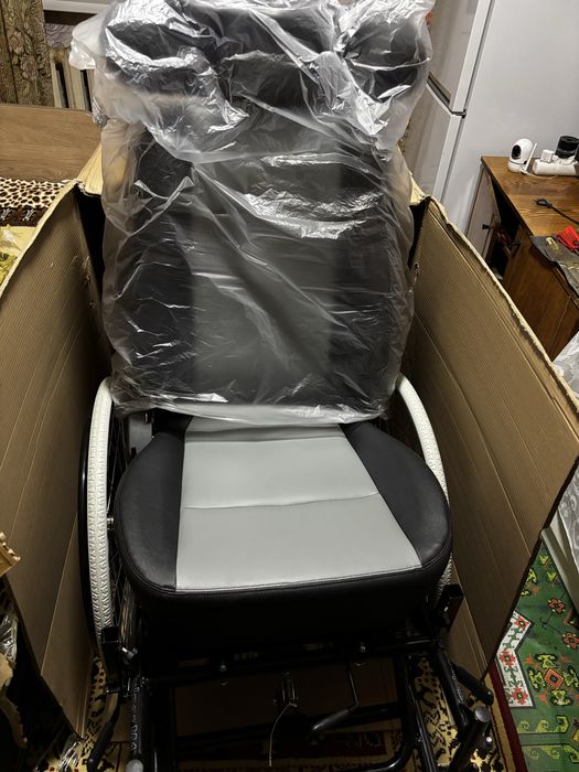 Инвалидная коляска