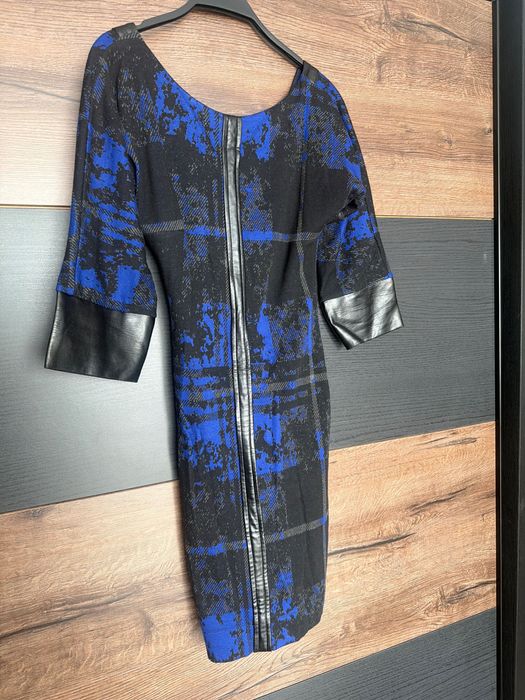 Рокля с кожени елменти