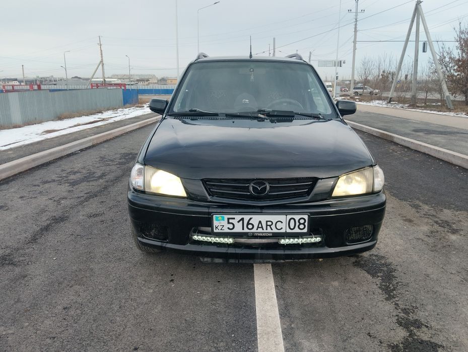 Mazda Demio 2003 г