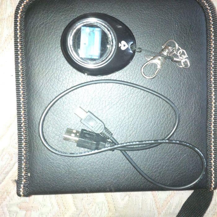 Эксклюзивный брелок-будильник от PokerStars