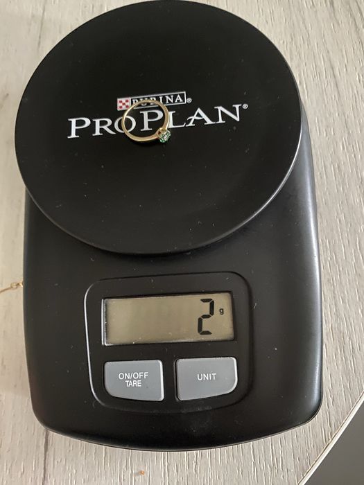 Inel de aur de 14 k cu zirconii verzi