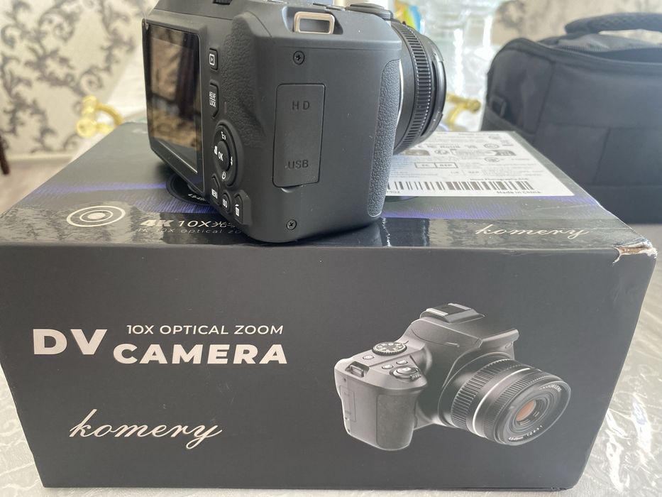 Видеокамера и фотоаппарат