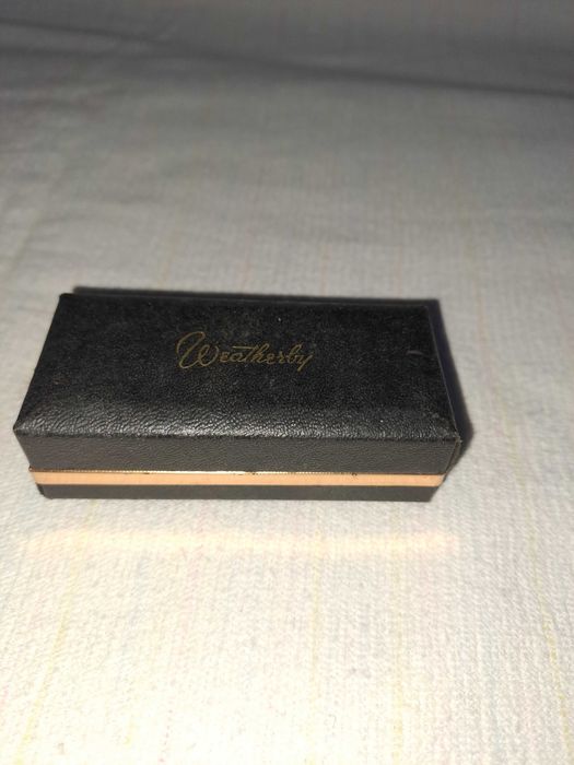 ac de cravata Weatherby gold rifle anii 1950