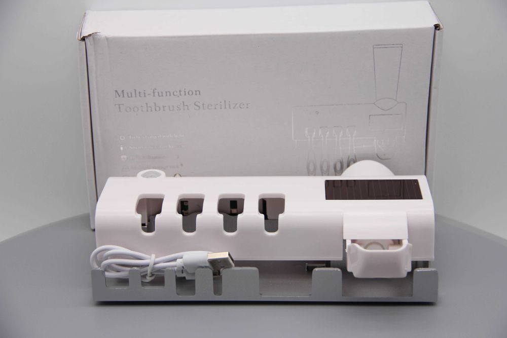 Suport periute si pasta de dinti cu functie de sterilizare