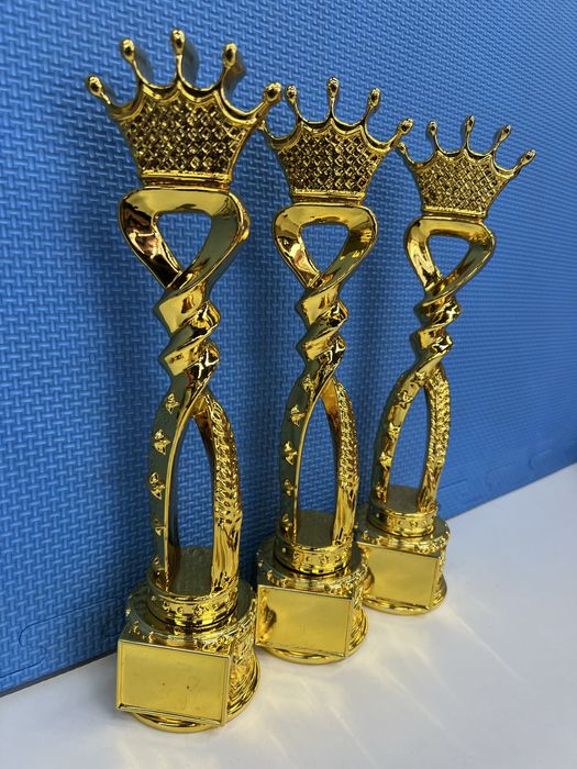Статуэтки кубки медали награды