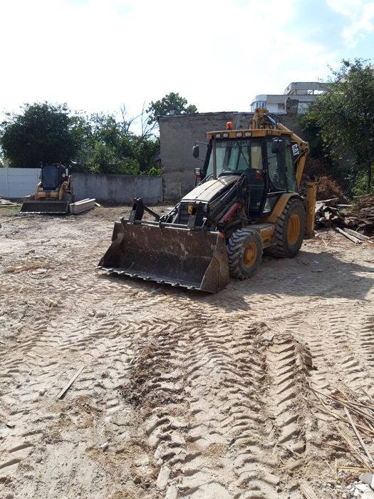 Transport evacuare moloz moluz demolare decopertare nivelare teren