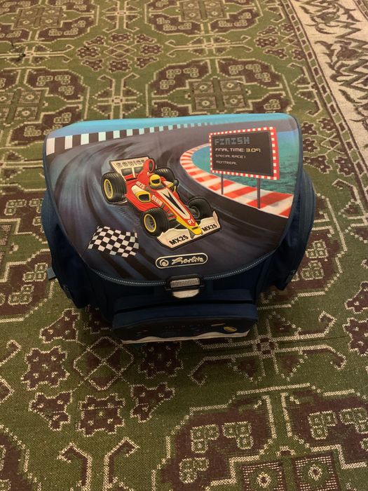 Ученическа раница за момче Herlitz Champion и несесер.