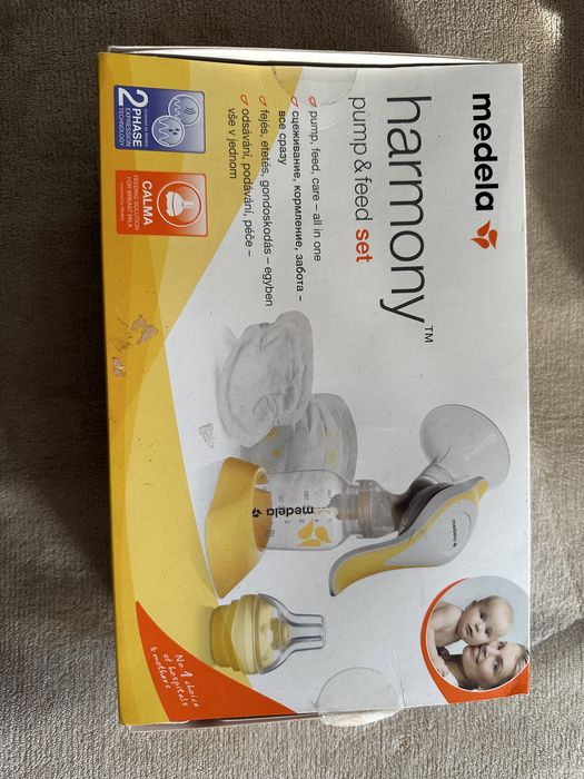 Молокоотсос Medela