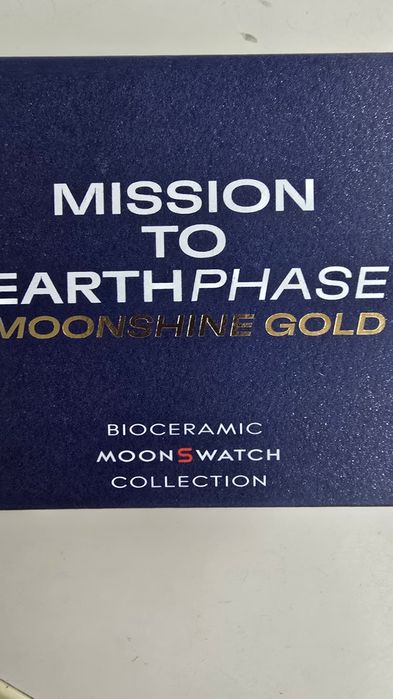 Swatch Omega Mission to Earthpase Moonshine Gold 
Ce