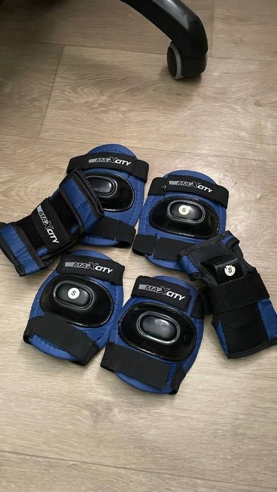 Роликовые коньки