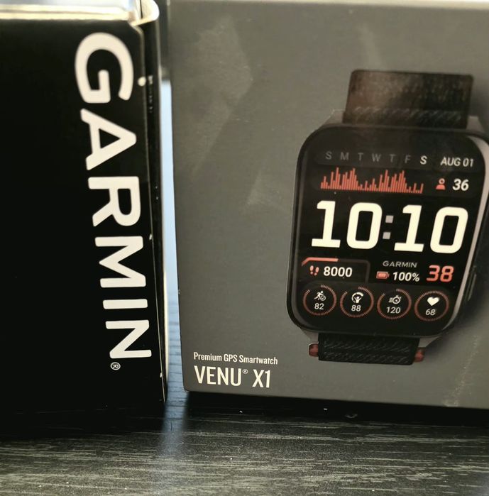 Smartwatch/Ceas Garmin Venu X1, negru cu spate din titan argintiu, curea din nailon ComfortFit Neagra