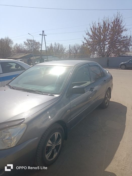 Авто Митцубиси Ланцер 2011г.