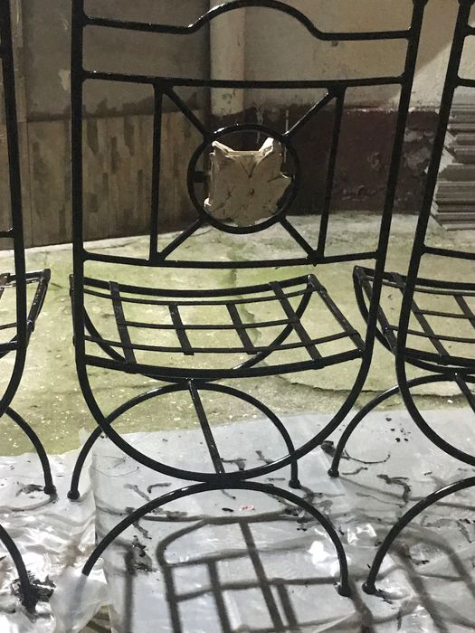 Scaune de grădina din fier forjat .