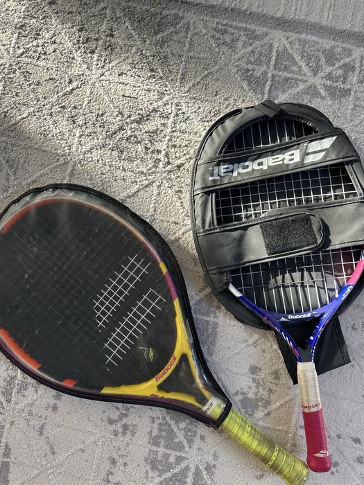 Теннисный ракетки