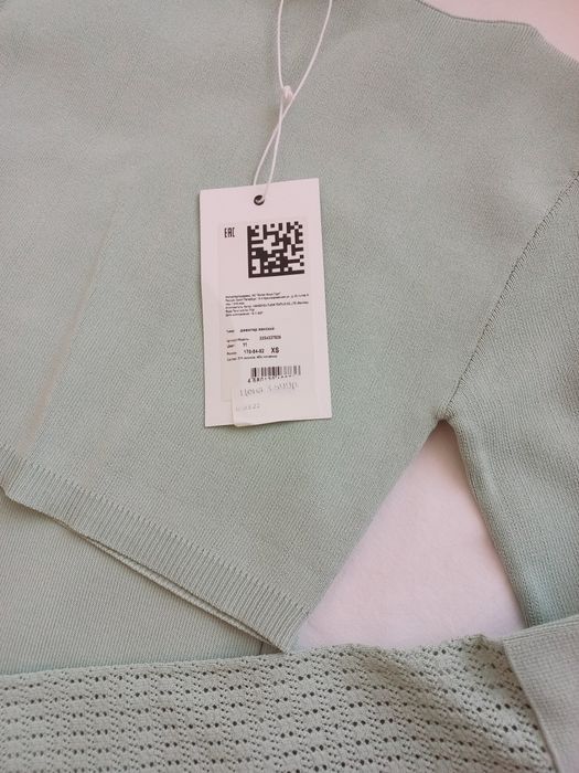 Янги кийилмаган кийим.