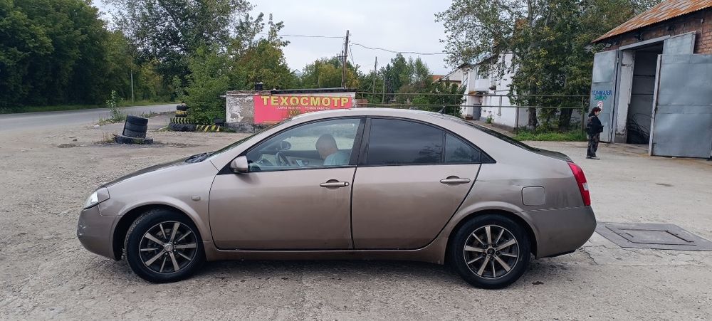 Nissan primera 2004 год