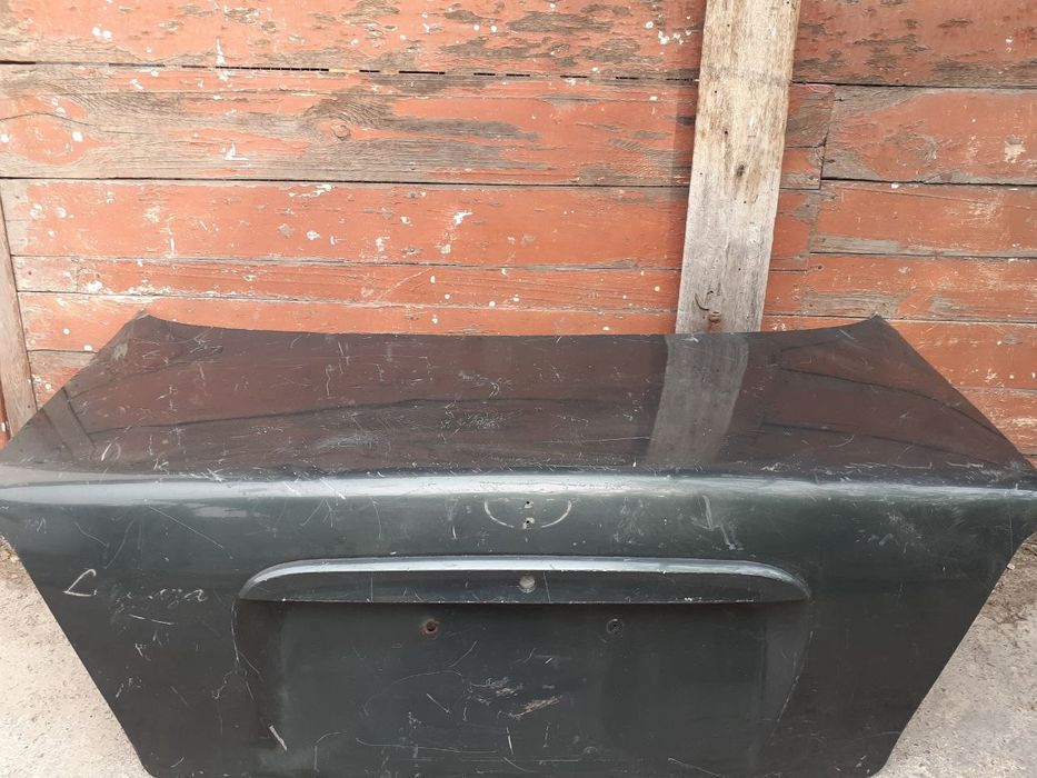 Koreya b/u  LEGANZA  kuzov qismlari orqa bagaj va oldi öng eshik.