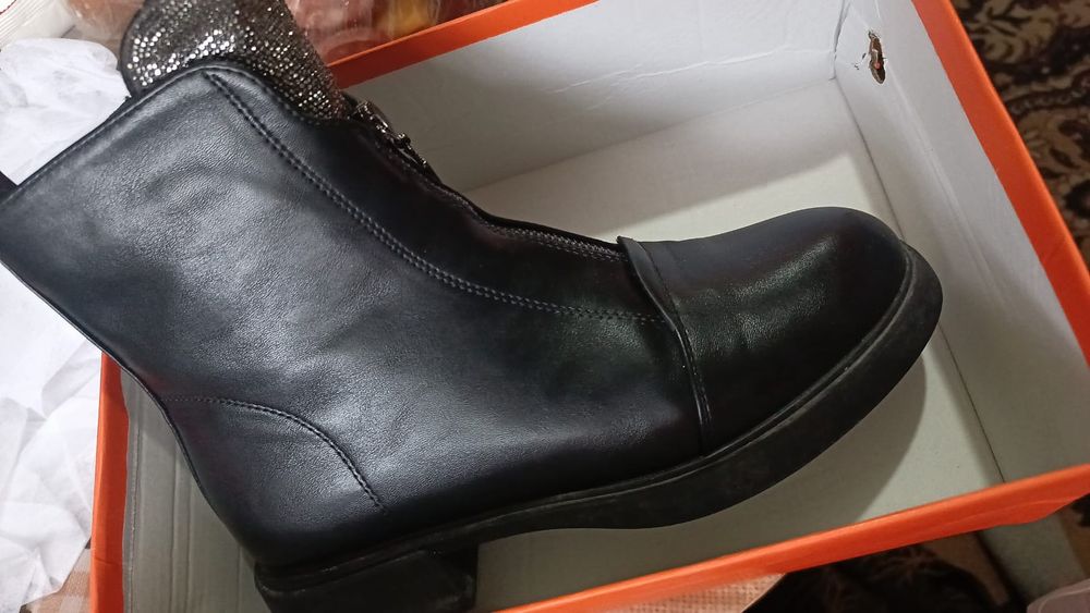 Продам новые сапоги