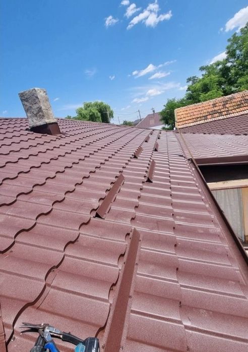 Reparati acoperisuri case și blocuri