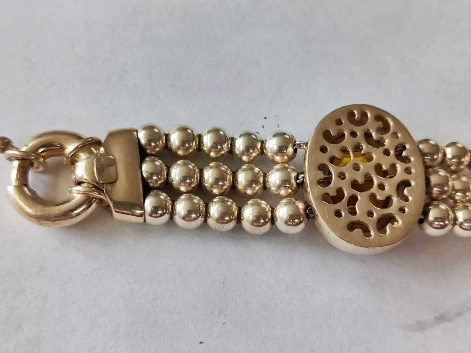 Сребърна гривна с кехлибар